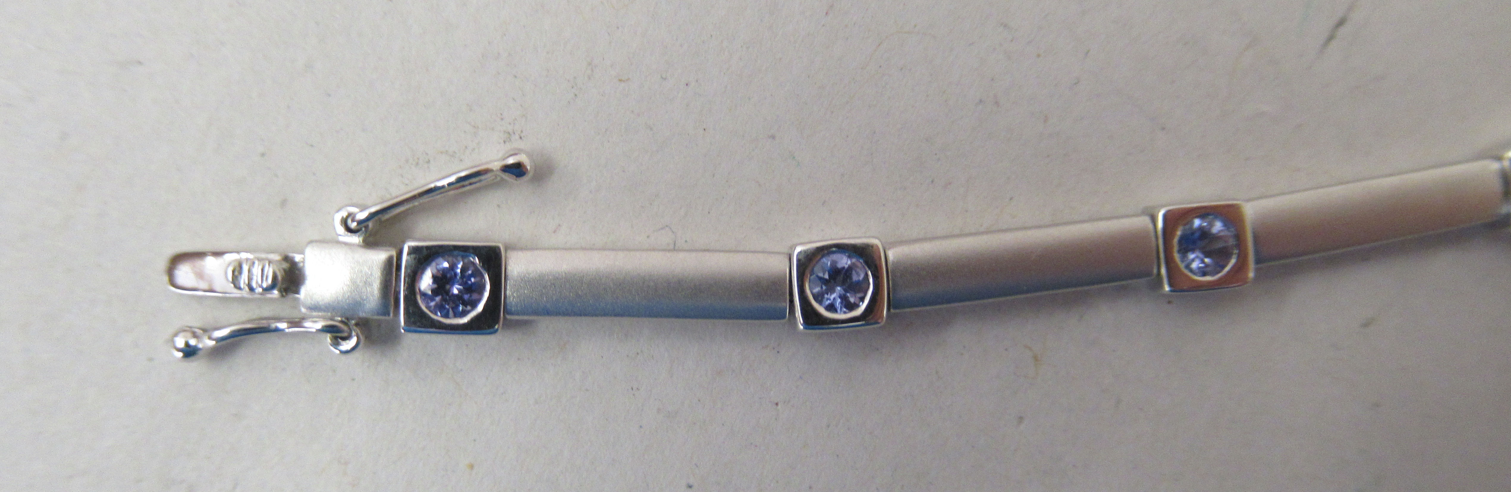 An 18ct white gold multi-link bracelet, set with light blue coloured stones - Image 2 of 3