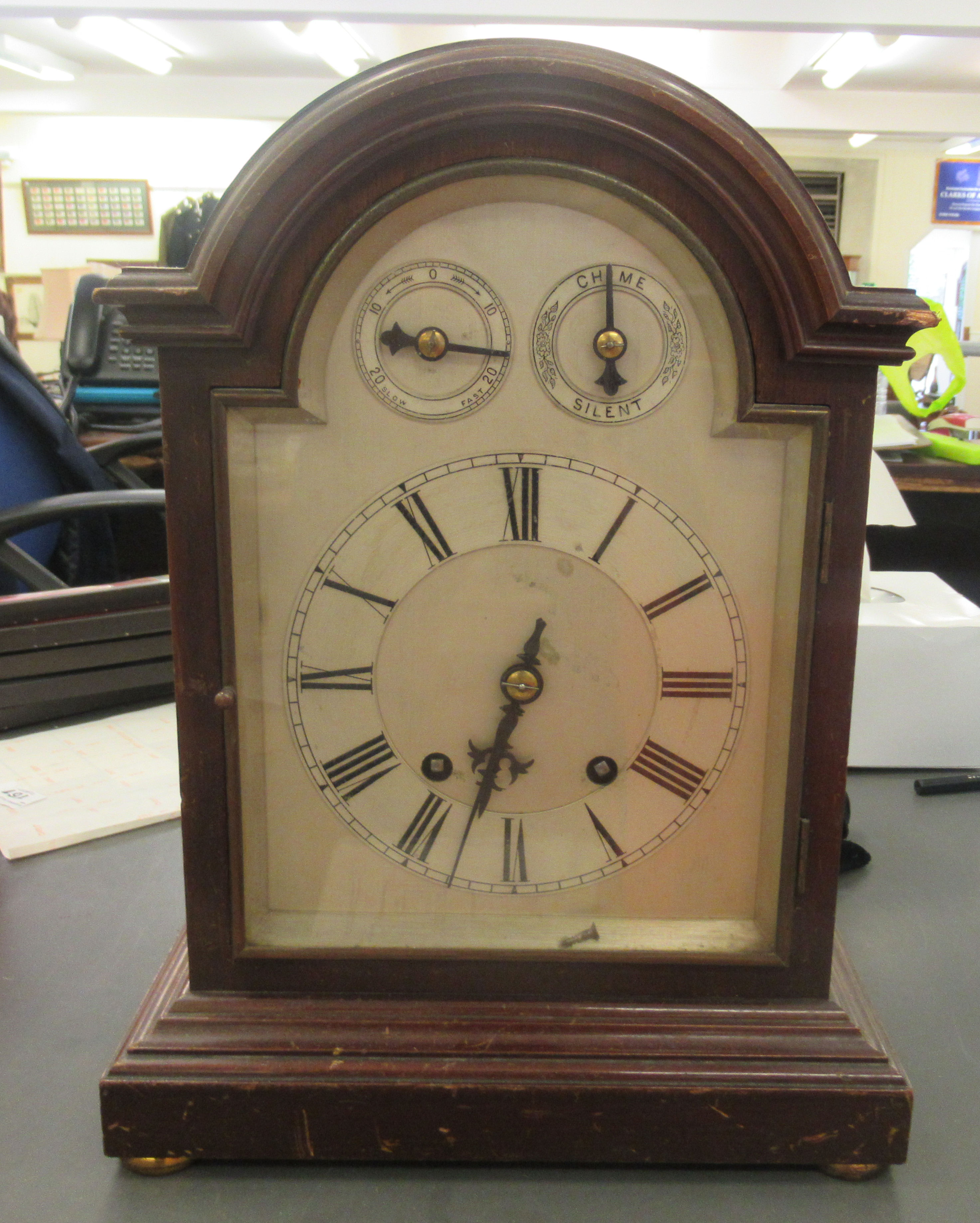 A mid 20thC mahogany cased bracket clock; the 8 day movement faced by a silvered Roman dial with