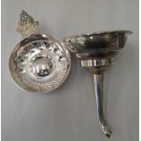 A modern three part silver wine funnel; and a silver wine taster with a cast fruiting vine tab