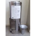 An (unused) Pither 'Studio 2' cylindrical stainless steel cased anthracite burning stove approx.