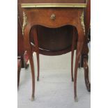 A late 19thC Continental kingwood and marquetry, serpentine outlined vanity table, the hinged top