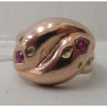 A 9ct rose gold and ruby eye set snake ring