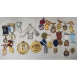 Uncollated Masonic medallions, fashioned in yellow and white metal and coloured enamel