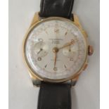 A Suisse 18ct gold cased chronograph, the movement with sweeping seconds, faced by an Arabic and