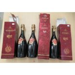 Three bottles of Gosset Grande Reserve Champagne