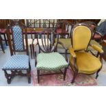 Three 20thC chairs: to include an oak high back; a Sheraton Revival mahogany framed examples with