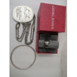 Danish jewellery, viz. a Jorgen Jensen pewter pendant necklace; a Georg Jensen silver ring  boxed;