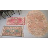 Three modern pastel coloured floral pattern hearth rugs  largest 48" x 24"