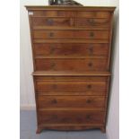 A modern reproduction of a 19thC yewwood finished tallboy, comprising two short/over seven graduated