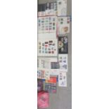 Uncollated postage stamps; coins; and cigarette cards