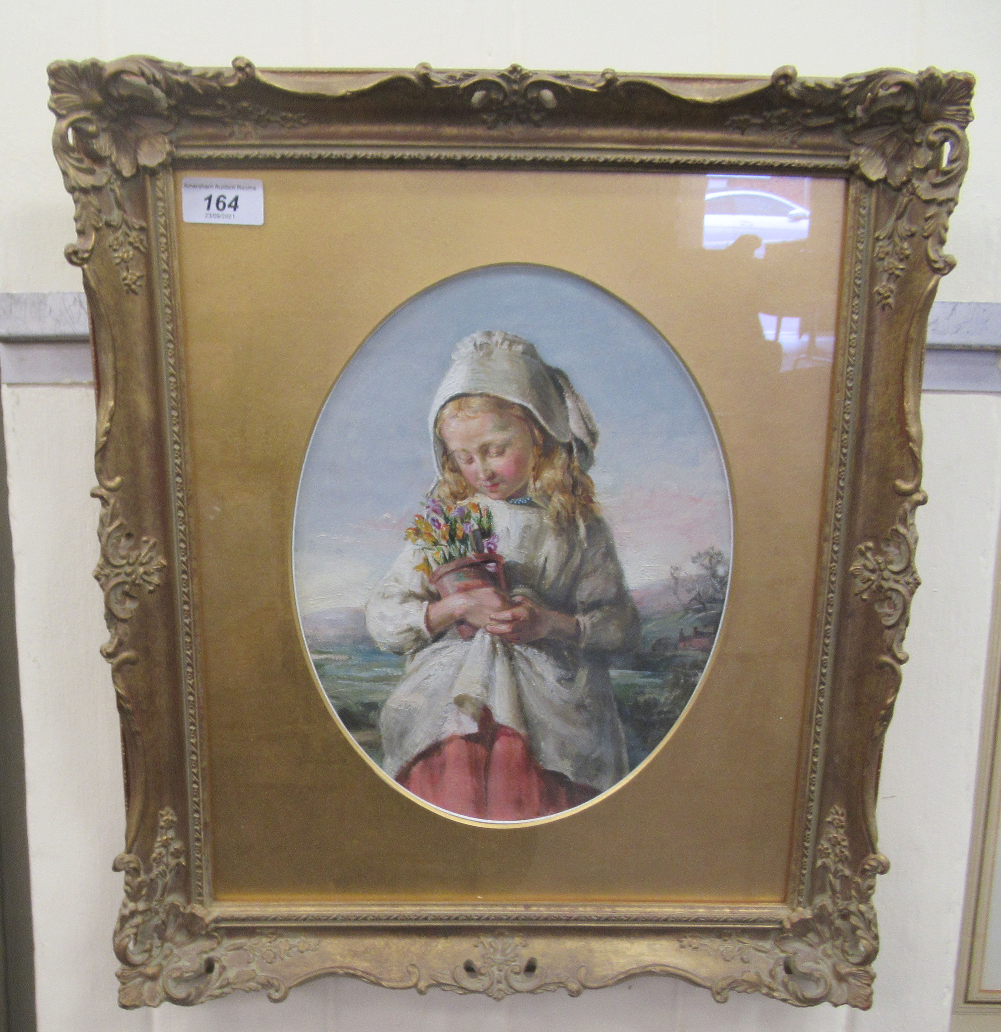 19thC Continental School - a half length portrait, a little girl carrying a pot of flowers  oil on