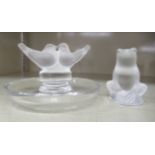 Lalique glass, viz. a ring stand, surmounted by two birds  2.5"h; and a frog  2.25"h