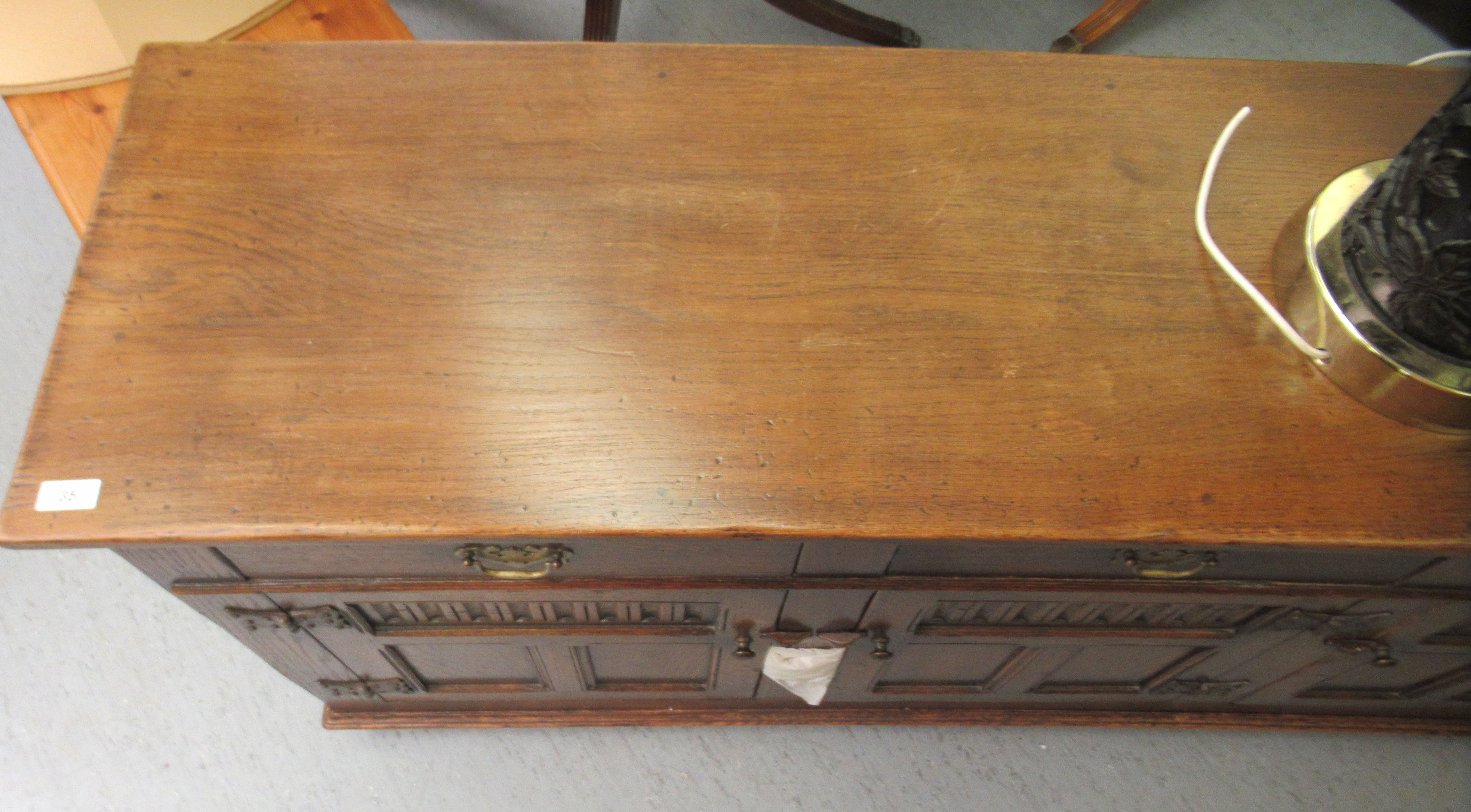 A Titchmarsh & Goodwin Old English style carved and panelled oak sideboard, comprising three - Image 3 of 4