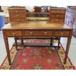 An Edwardian lady's crossbanded and satinwood inlaid mahogany writing desk, the superstructure