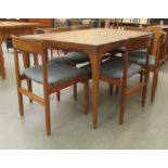 A 1960s/70s Uldum Mobelfabrik Danish teak dining table, incorporating a single concealed leaf,