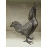 A patinated cast metal garden ornament, a cockerel  18.5"h