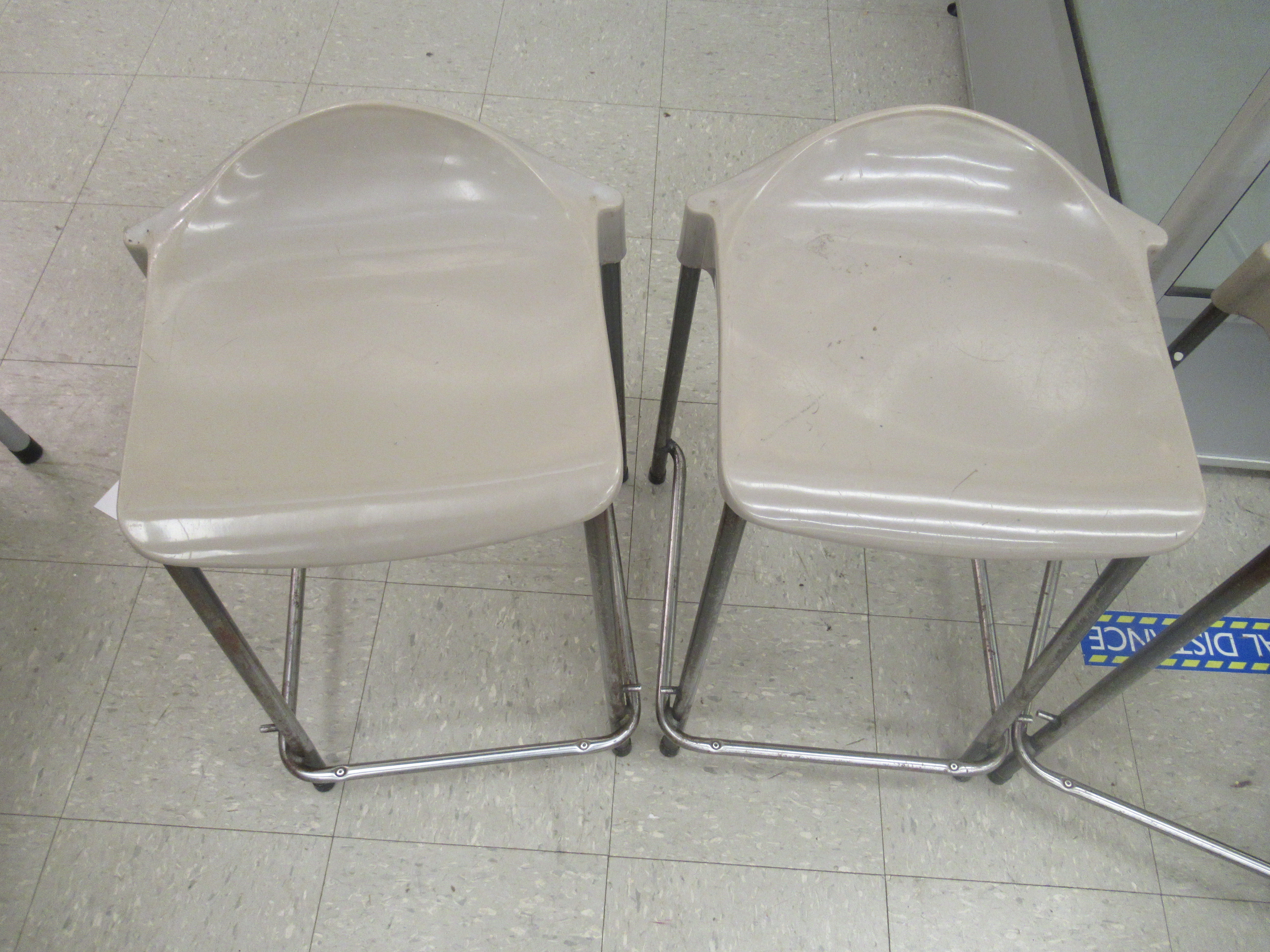 A set of four mid/late 20thC Steelux London, GLC Design tubular steel framed work stools with - Image 3 of 4