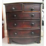 A mid 19thC mahogany traders sample, fashioned as a bow front dressing chest with two short/three