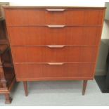 A 1970s Austin Suite teak four drawer dressing chest, raised on square, tapered legs  37"h  31"w