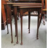 A nesting set of three early/mid 20thC burr walnut finished occasional tables, raised on slender