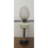 A late Victorian glass and brass mounted oil lamp, on a circular plinth  26"h