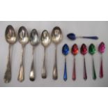 Five various silver/white metal teaspoons; and a set of six multi-coloured enamelled coffee spoons