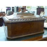 An early 20thC figures and rope carved burr oak table casket design canteen (empty) with a hinged