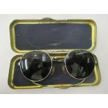 A pair of World War II pilots sunglasses, the frames inscribed PGBL, the case printed 229/1398, Type