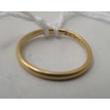 A 22ct gold wedding band