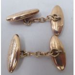 A pair of 9ct gold torpedo shape cufflinks