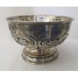 An Art Nouveau silver trophy rose bowl of traditional form, on a waisted, domed pedestal foot,