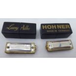 Two miniature harmonicas, viz. one Hohner 'Little Lady', the other Hohner 'Larry Adler' in black