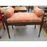 A modern Victorian design, stained and lacquered beech window seat with a gold and pink fabric