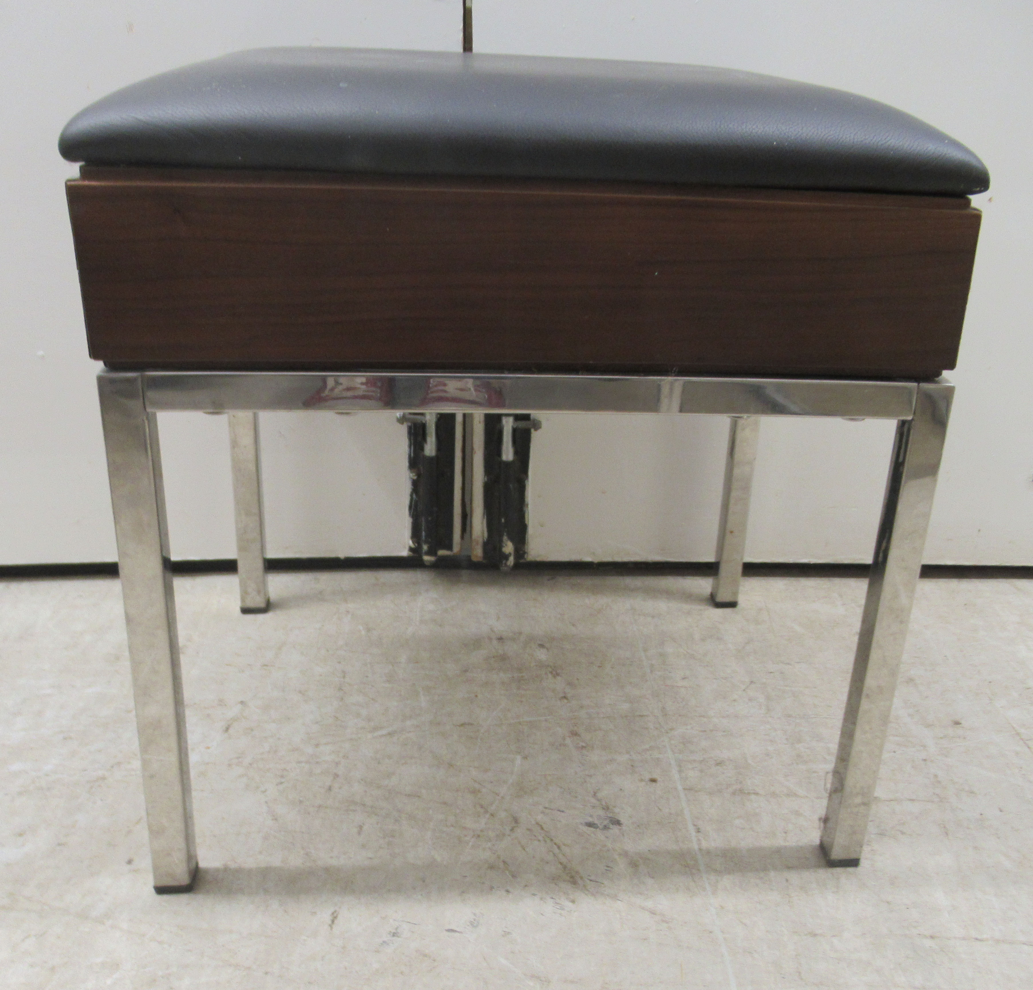 A modern Bentley Design UK stool, the cushioned black vinyl seat over a teak finished panel, - Image 3 of 3