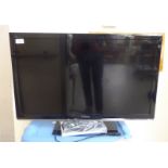 A Panasonic Viera 20" television with a remote control