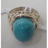 A silver and turquoise set dress ring