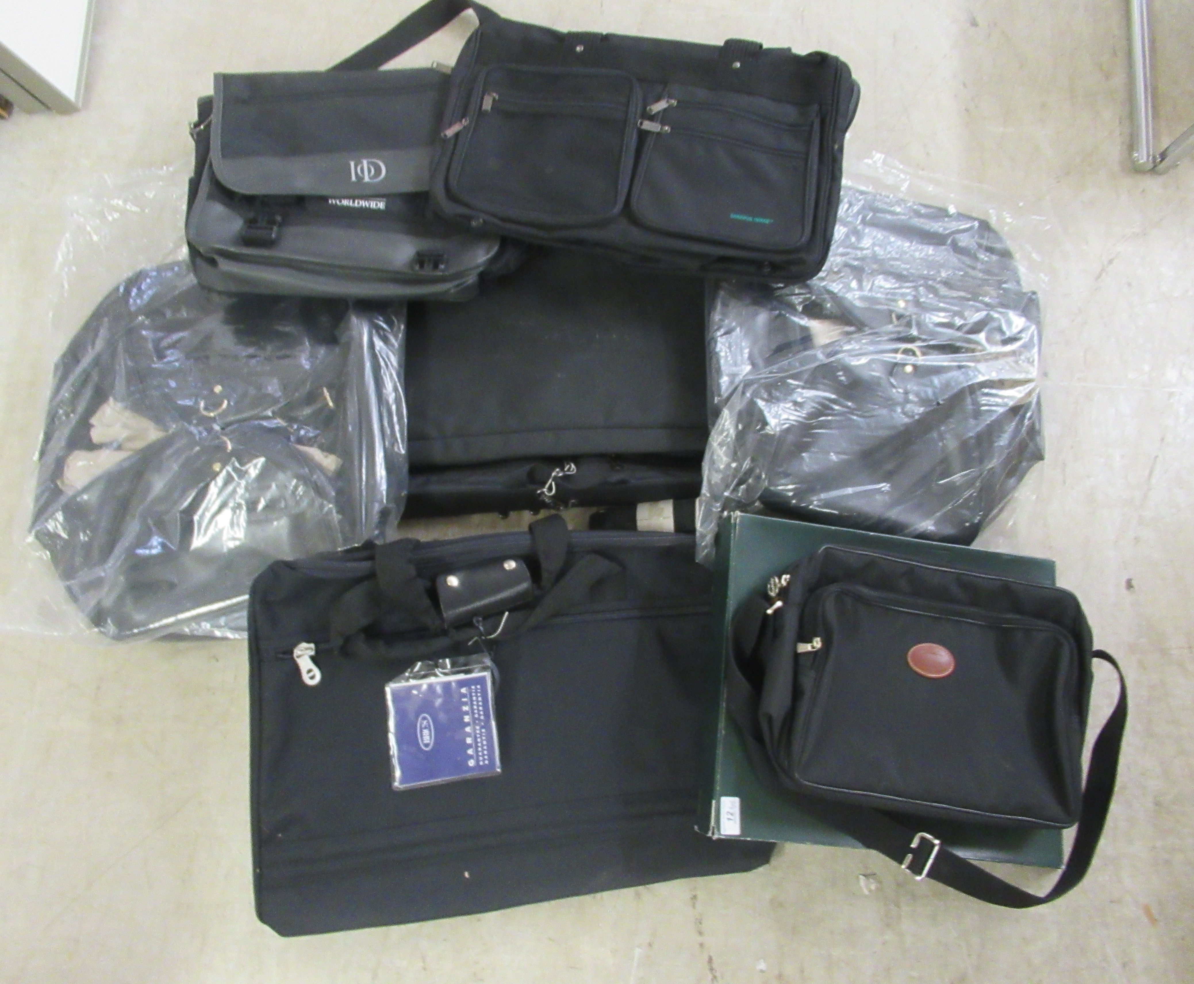 Sports bags and light travelling cases: to include a Longchamp of Paris satchel  boxed