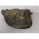 A brass novelty vesta case, fashioned as a bird, incorporating a striking plate