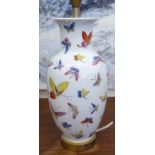 In the manner of Herend, a porcelain table lamp, decorated in bright colours with butterflies  11.