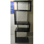 A modern abstract, open cube design, piano black lacquered display unit  65"h  24"w