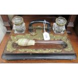 A late Victorian walnut and brass mounted deskstand with two inkwells  12"w  8"deep