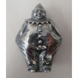 A silver plated novelty vesta case, fashioned as a standing clown