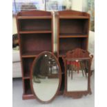 Small furniture: to include a pair of early 20thC mahogany narrow open front bookcases  42"h  15"w