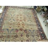 A Persian carpet, decorated with stylised floral designs, on a multi-coloured ground  92" x 146"