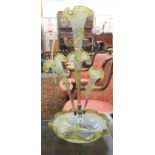 A late Victorian clear and green tinted glass epergne with four trumpets (one broken off) and a
