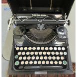A Continental manual typewriter  cased; and another Olympia example  cased