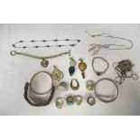 Silver and white metal items of personal ornament: to include two bangles and rings  variously