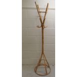 A modern bamboo effect stickstand  62"h