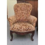 A late 19thC Continental salon chair with a gold coloured crushed fabric upholstered back and