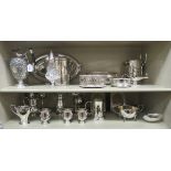 Silver plated tableware: to include a Victorian style wine bottle coaster and a claret jug